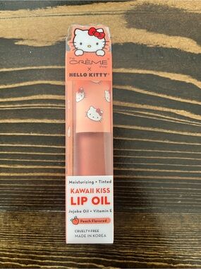 Hello Kitty Peach Tinted Lip Oil - Coral Pink Packaging